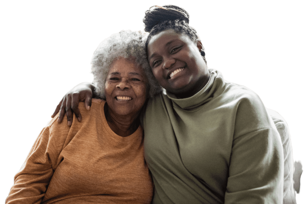 Caregiver and patient sharing a warm moment at home